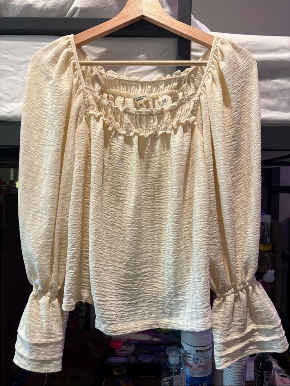 Light yellow flowy blouse